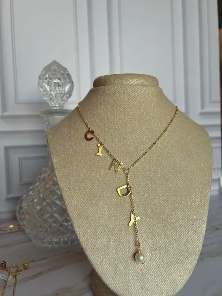 Corbatin de 5 letras Goldfield